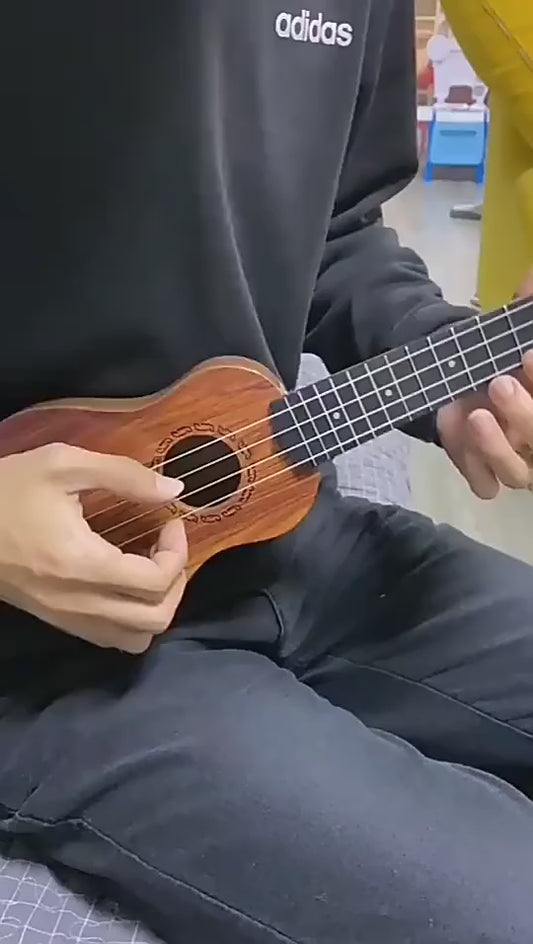 Mini Wooden Finish Plastic Guitar Music Instrument with 4 strings Clear sound